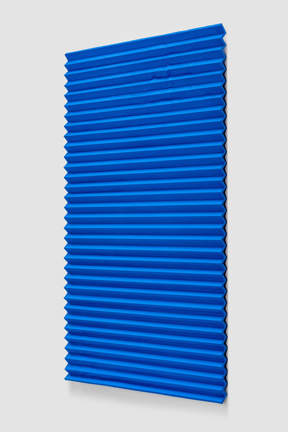 Hagen, initiation ii (accordion fold, phthalo blue) (view 2), 2017, cast acrylic paint, molding paste, fiberglass reinforced plastic, aluminum armature, 83 x 43 x 3 in., 210.8 x 109.2 x 7.6 cm, cnon 60.898 joshua wilson white