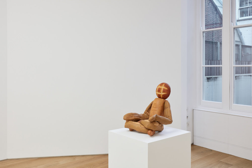 Johnson, bread figure (sitting cross legged) (installed), 2018, carved wood with paint, 18 1 2 x 15 1 4 x 15 1 2 in., 47 x 38.7 x 39.4 cm, cnon 59.831