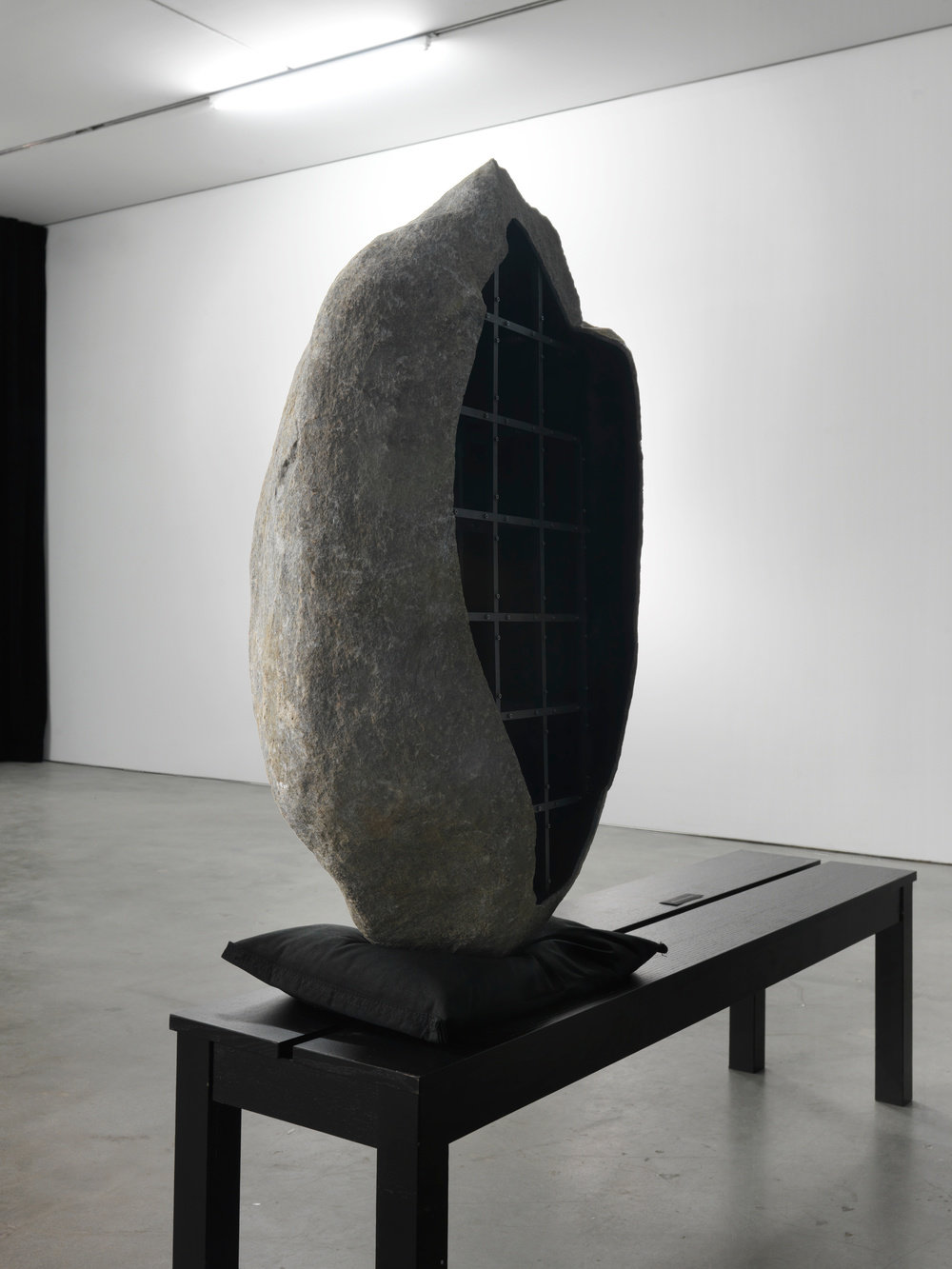 Von bismarck, boulder 1 (view 2), 2015, hollowed boulder, metal framework, sandbag, concrete, 43 x 20 x 17 in. 109.22 x 50.8 x 43.18 cm cnon 56.728