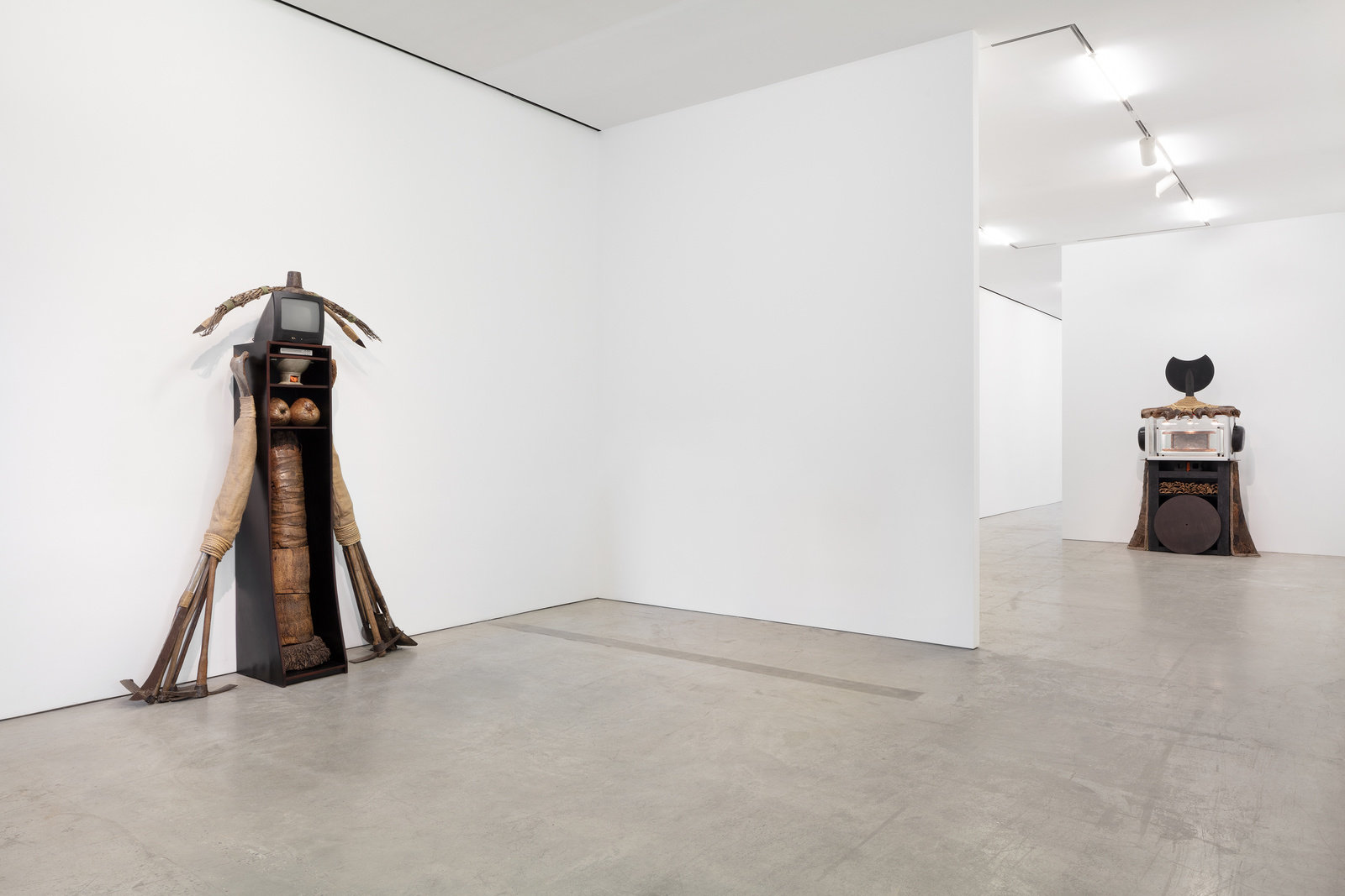 An installation view of two sculptures by Daniel Lind-Ramos. 