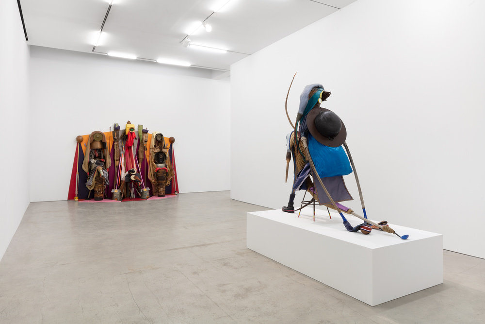 An installation view of two sculptures by Daniel Lind-Ramos. 