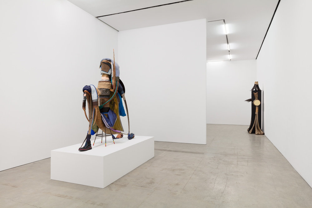 An installation view of two sculptures by Daniel Lind-Ramos. 