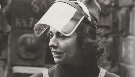 Beverly at work wearing a welding mask